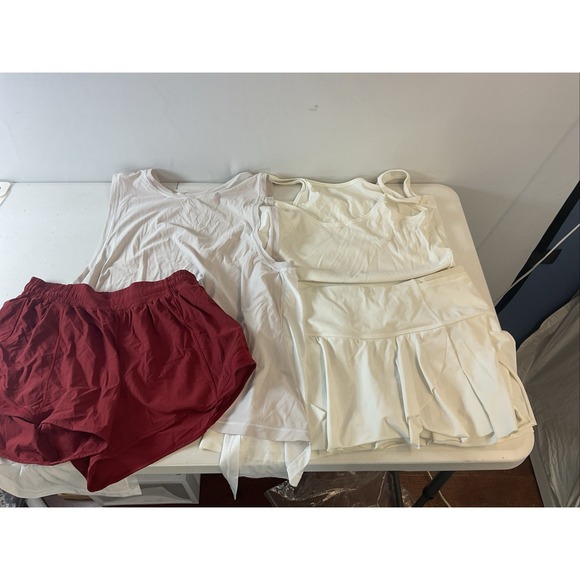 lululemon athletica Tops - lululemon size 8  T LOT  4 Pieces, white skort, maroon hotty hot, tanks